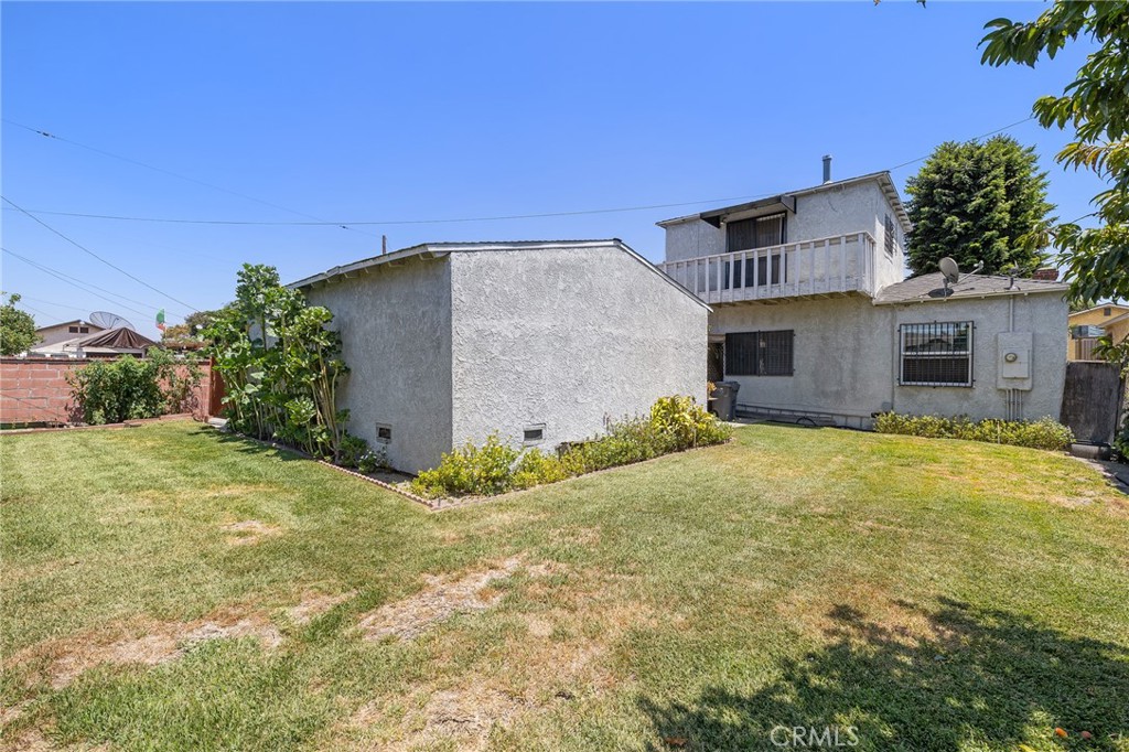 301 South Harris Avenue Compton, CA 90221 - Photo 27 of 30 a view of a house with backyard and garden