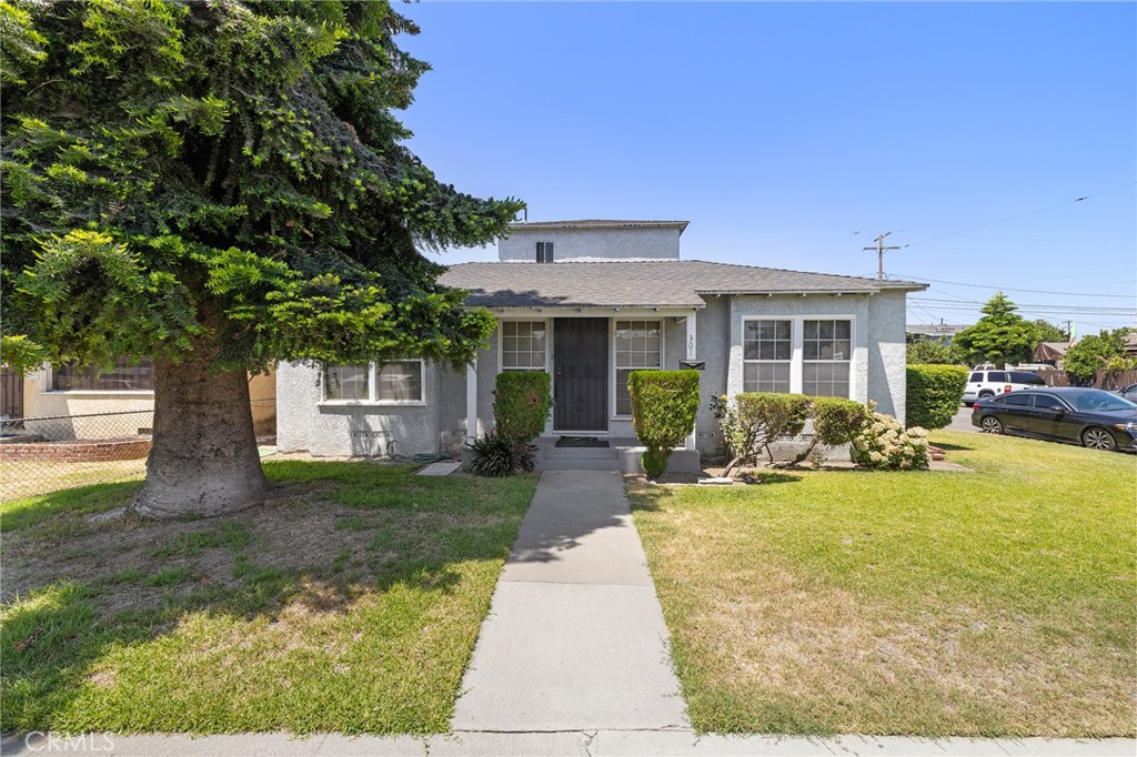 301 South Harris Avenue Compton, CA 90221 - Photo 5 of 30 a view of a house with backyard porch and sitting area