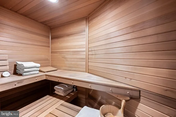 a view of living room with furniture and chandelier