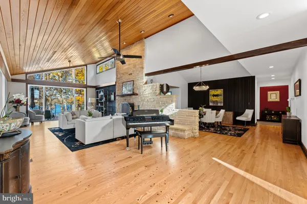 a living room with furniture fireplace and a fireplace