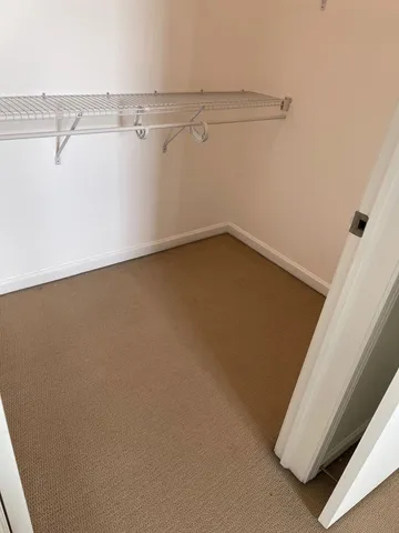 a view of a room with racks on the wall