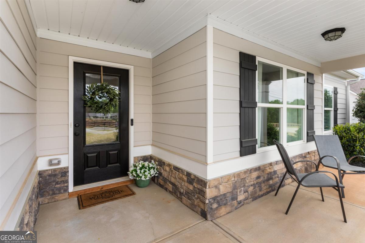 187 Loch Way Eatonton, GA 31024 - Photo 3 of 49 a view of an outdoor space with porch