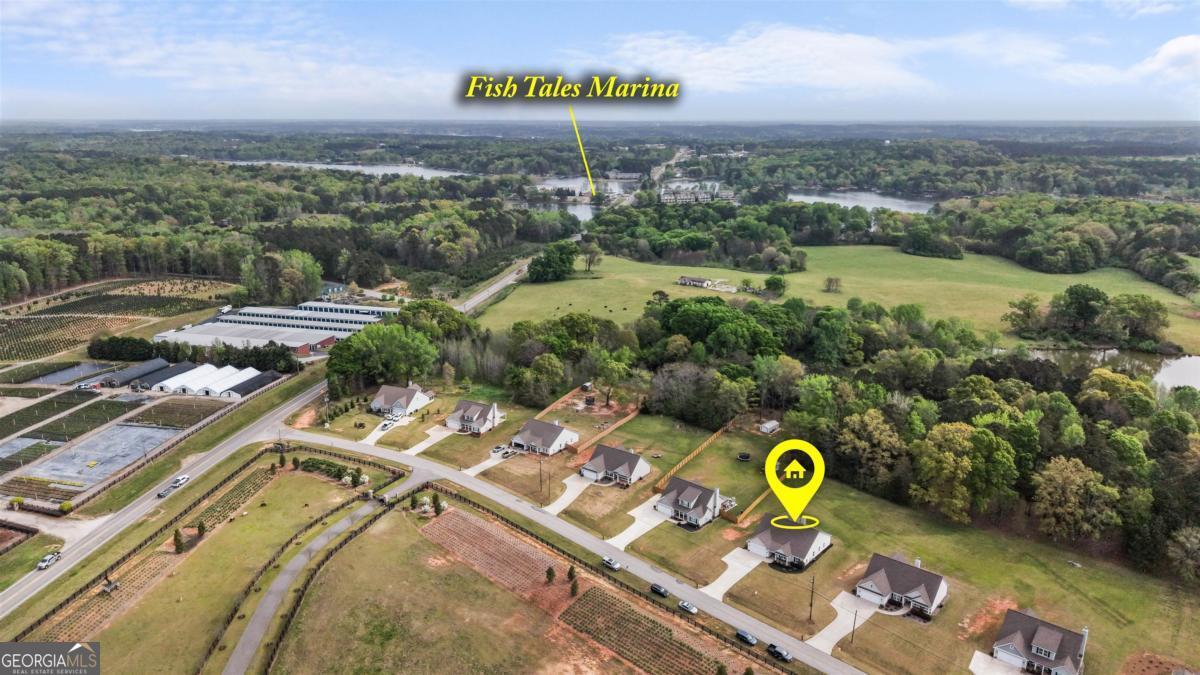 187 Loch Way Eatonton, GA 31024 - Photo 35 of 49 a view of a lake with outside space