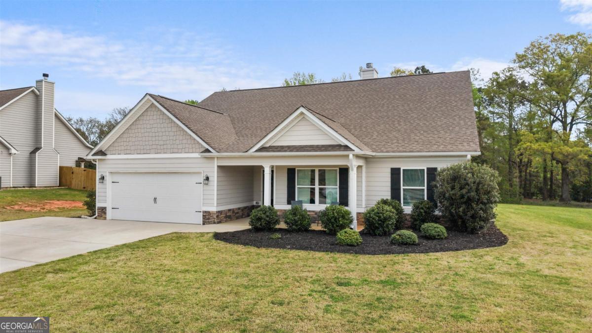 187 Loch Way Eatonton, GA 31024 - Photo 39 of 49 a view of a house with backyard and garden