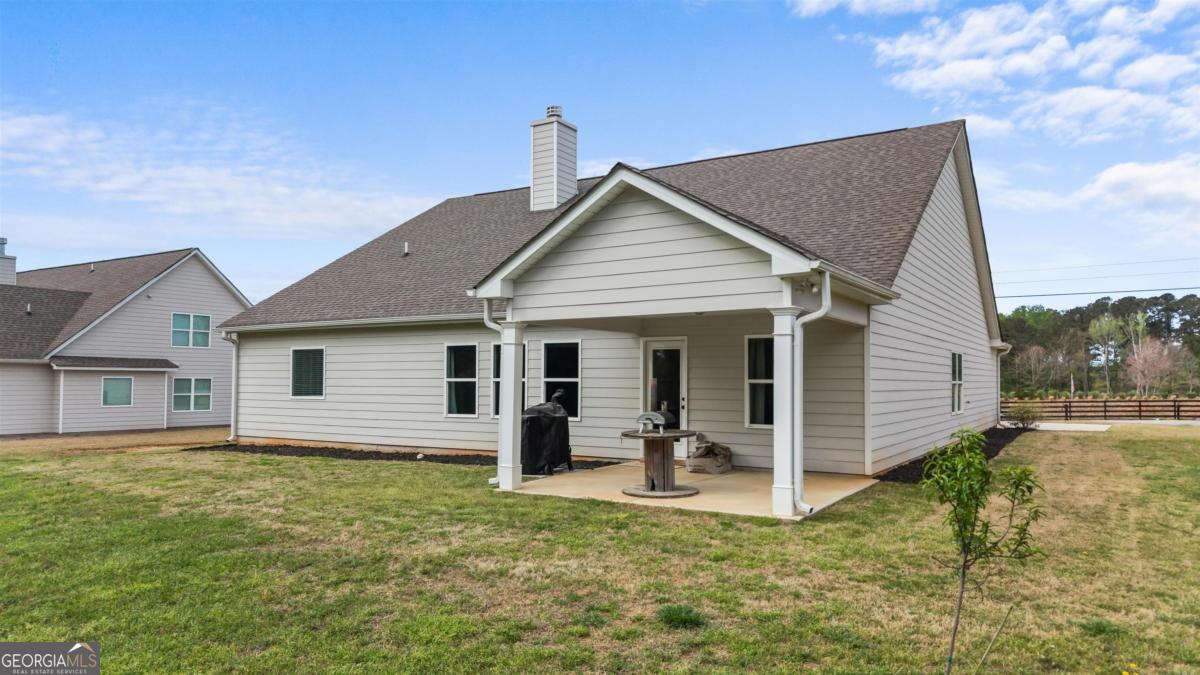 187 Loch Way Eatonton, GA 31024 - Photo 43 of 49 a view of a house with backyard