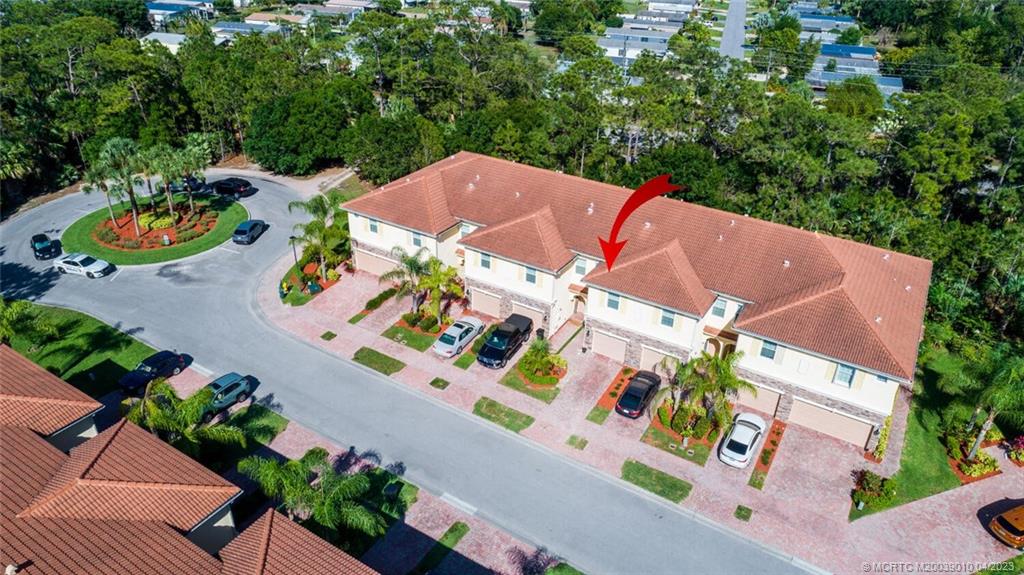 9726 Southwest Purple Martin Way Stuart, FL 34997 - Photo 23 of 30 an aerial view of a house with an outdoor space