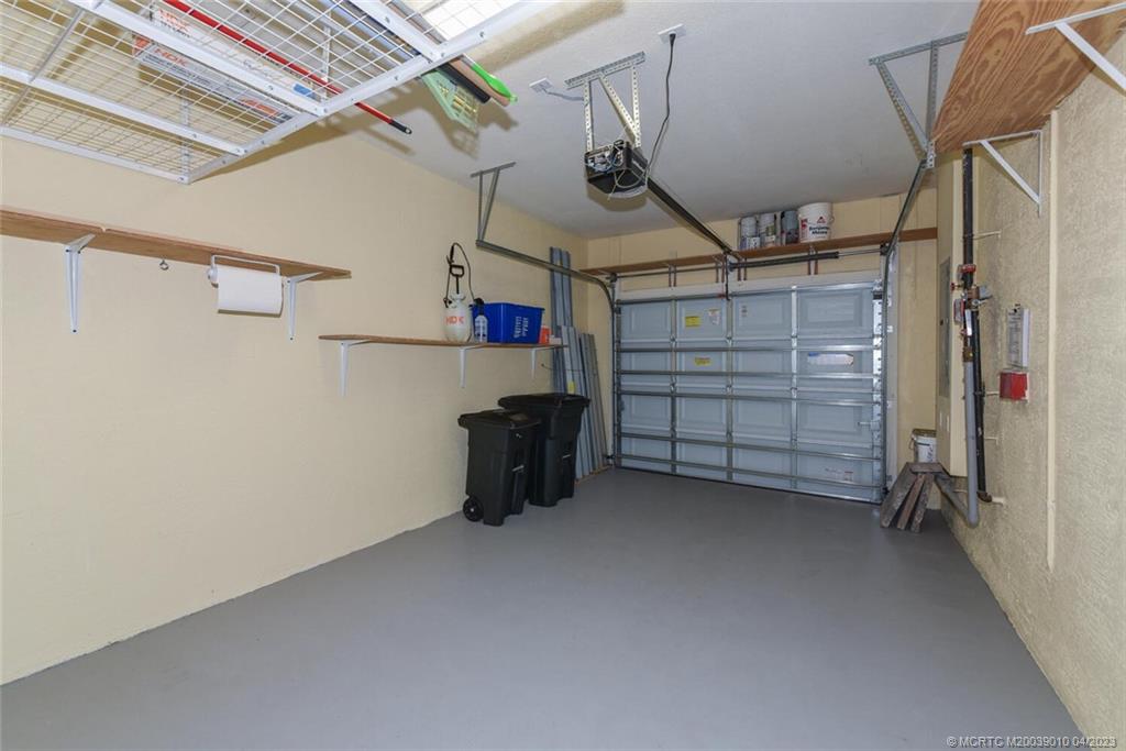 9726 Southwest Purple Martin Way Stuart, FL 34997 - Photo 24 of 30 a view of empty room with storage