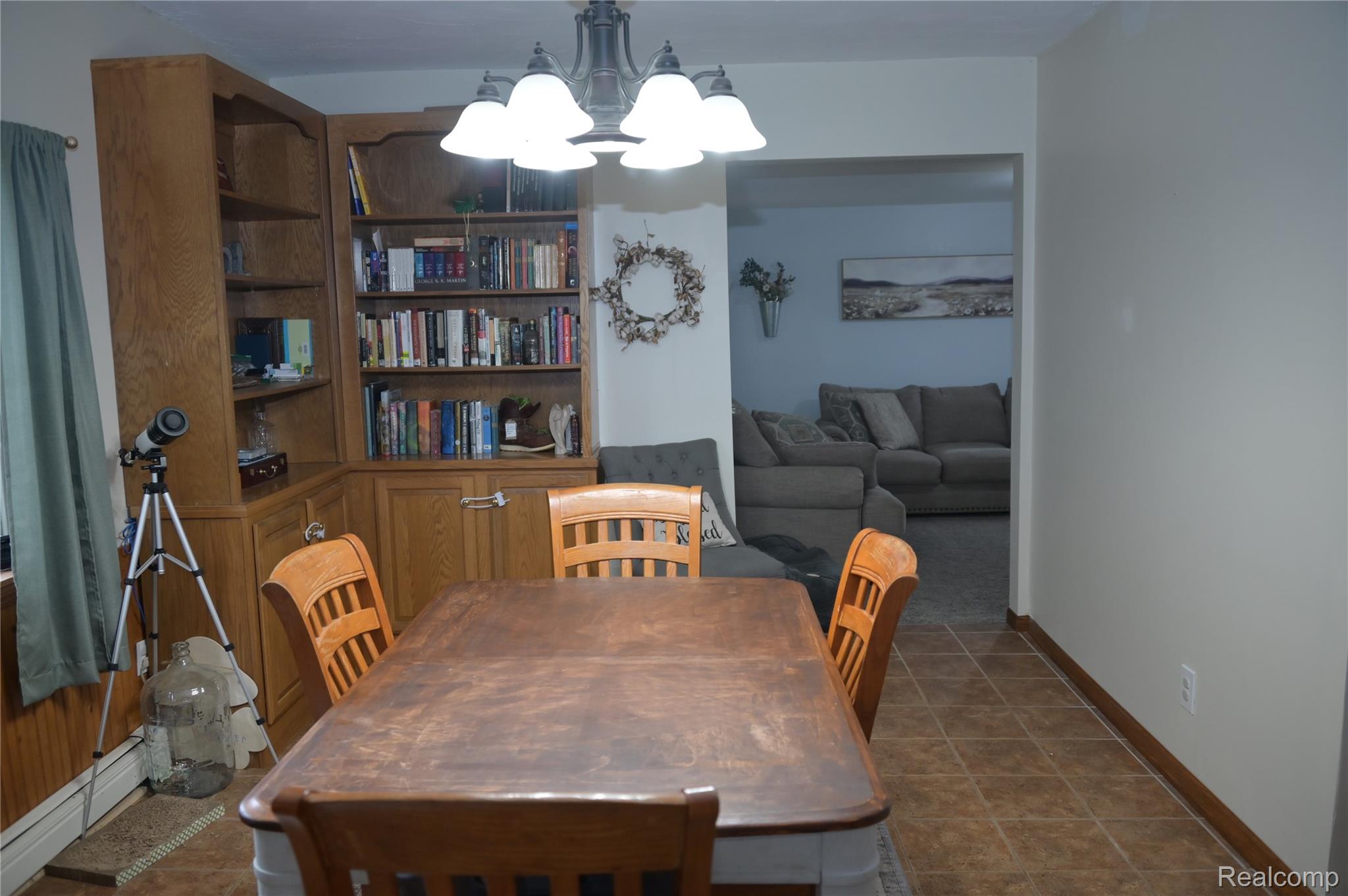 6950 Todd Road Croswell, MI 48422 - Photo 7 of 29 Built-in wood-finish shelving and cabinetry with glass-front accents