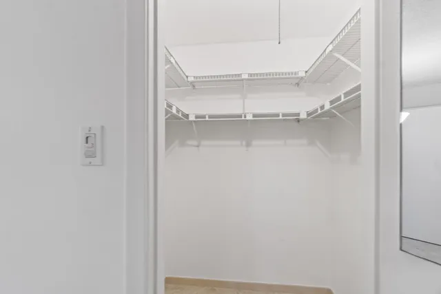 a room with lots of table and chairs