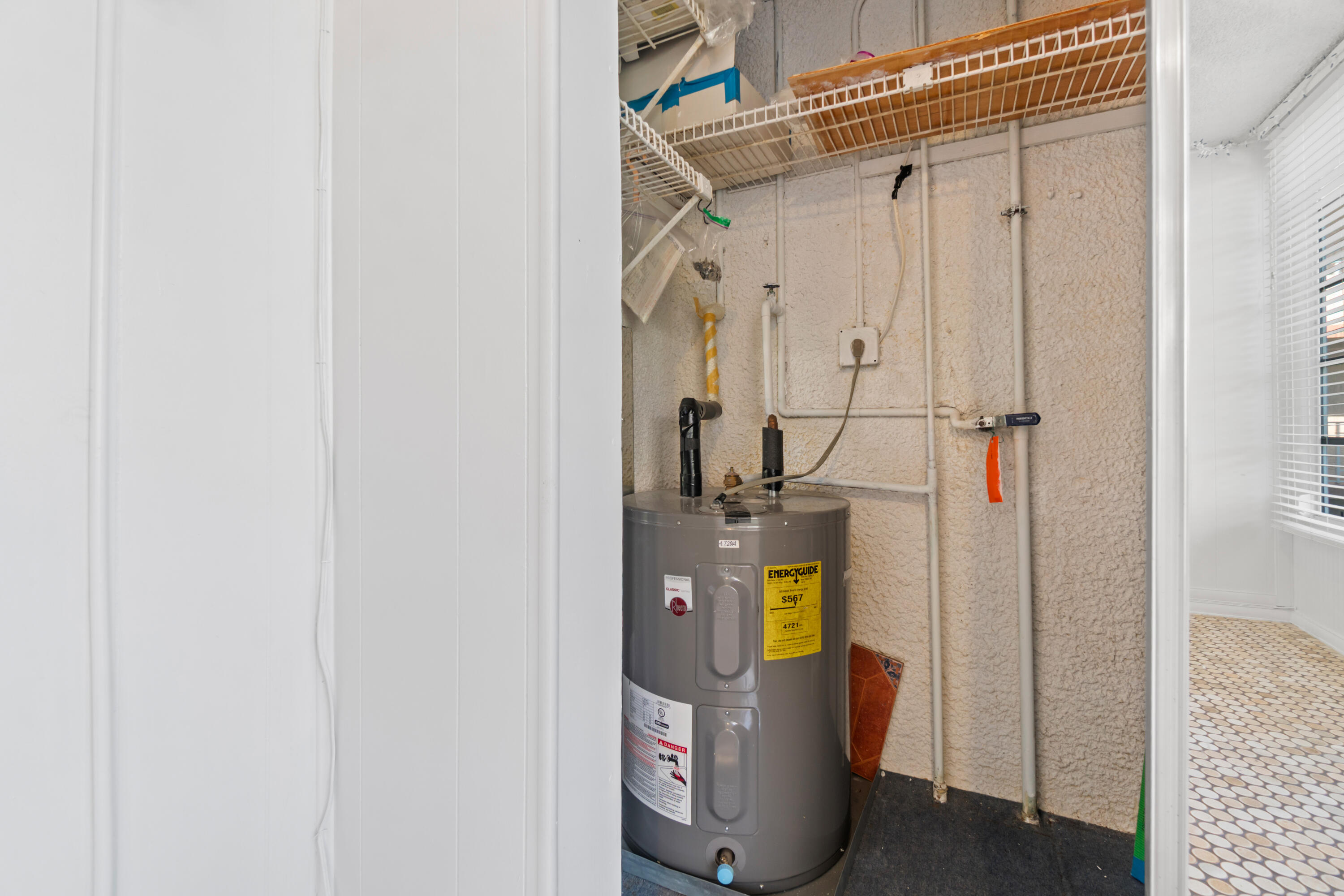 2615 Northeast 1st Court, Unit 303 Boynton Beach, FL 33435 - Photo 41 of 42 a view of storage and utility room