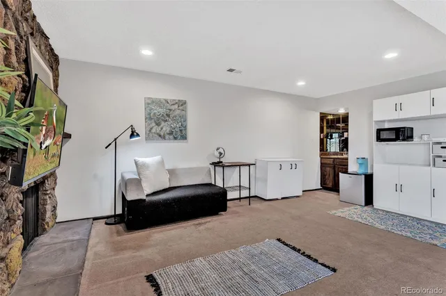 a bedroom with furniture and a bed