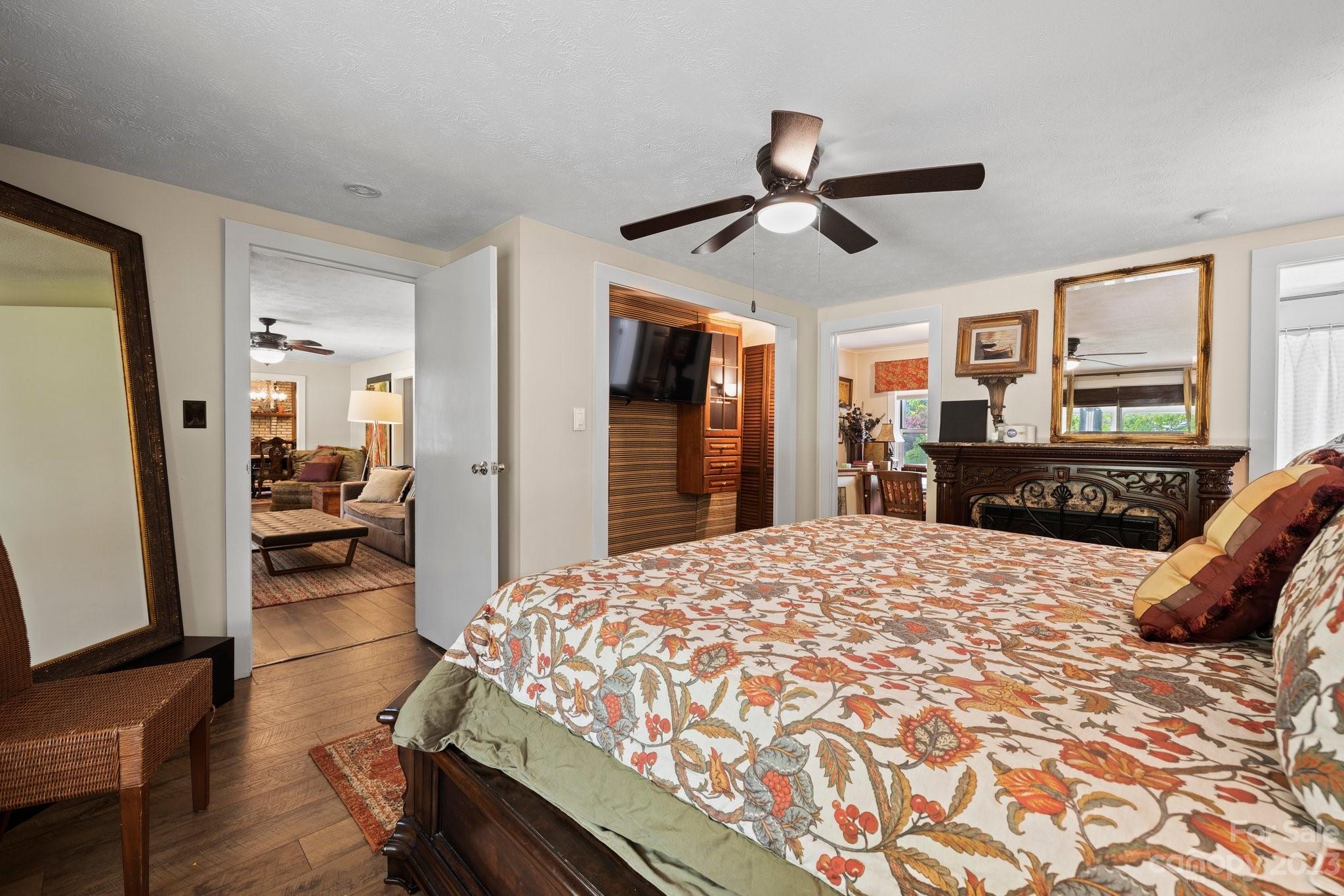 1545 Brevard Road Asheville, NC 28806 - Photo 13 of 43 a bed room with a bed and dresser