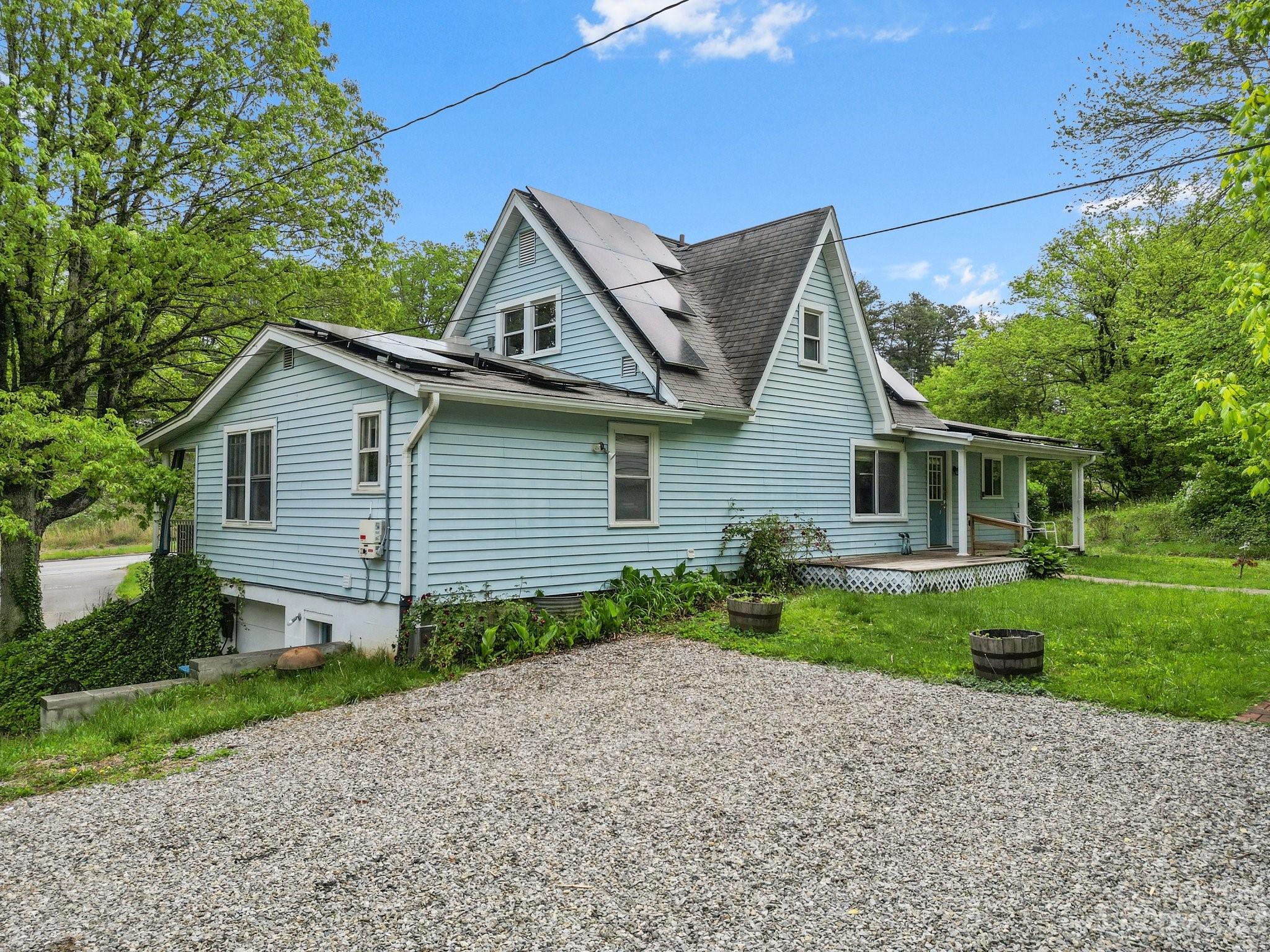 1545 Brevard Road Asheville, NC 28806 - Photo 2 of 43 a view of a back yard of the house