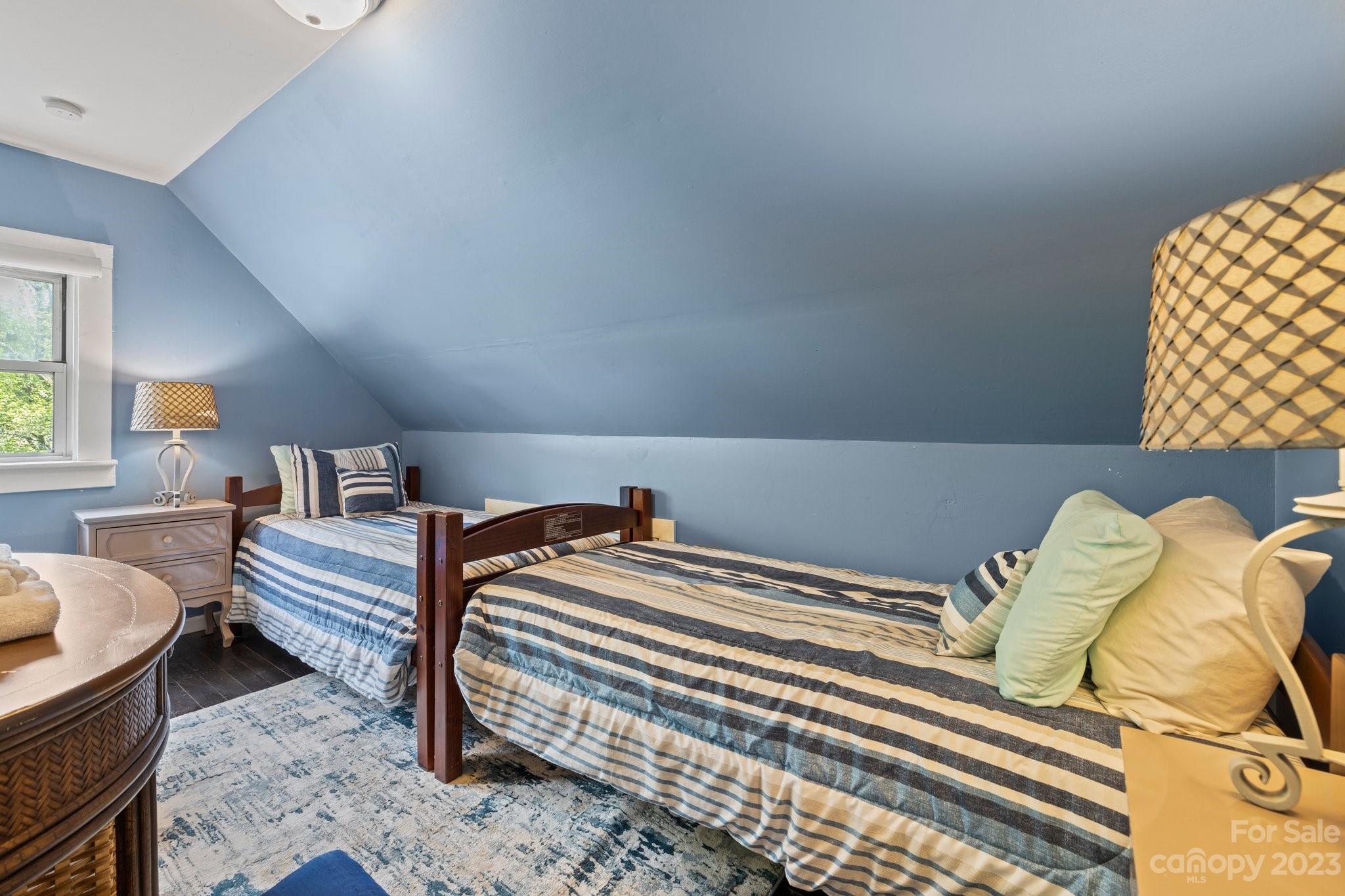 1545 Brevard Road Asheville, NC 28806 - Photo 22 of 43 a bedroom with two beds and a couch