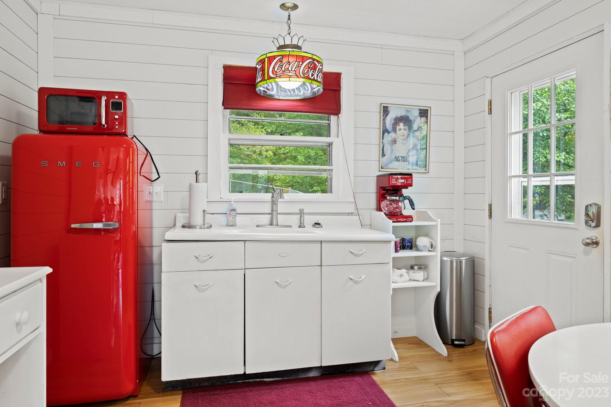 1545 Brevard Road Asheville, NC 28806 - Photo 29 of 43 a utility room with mirror and window