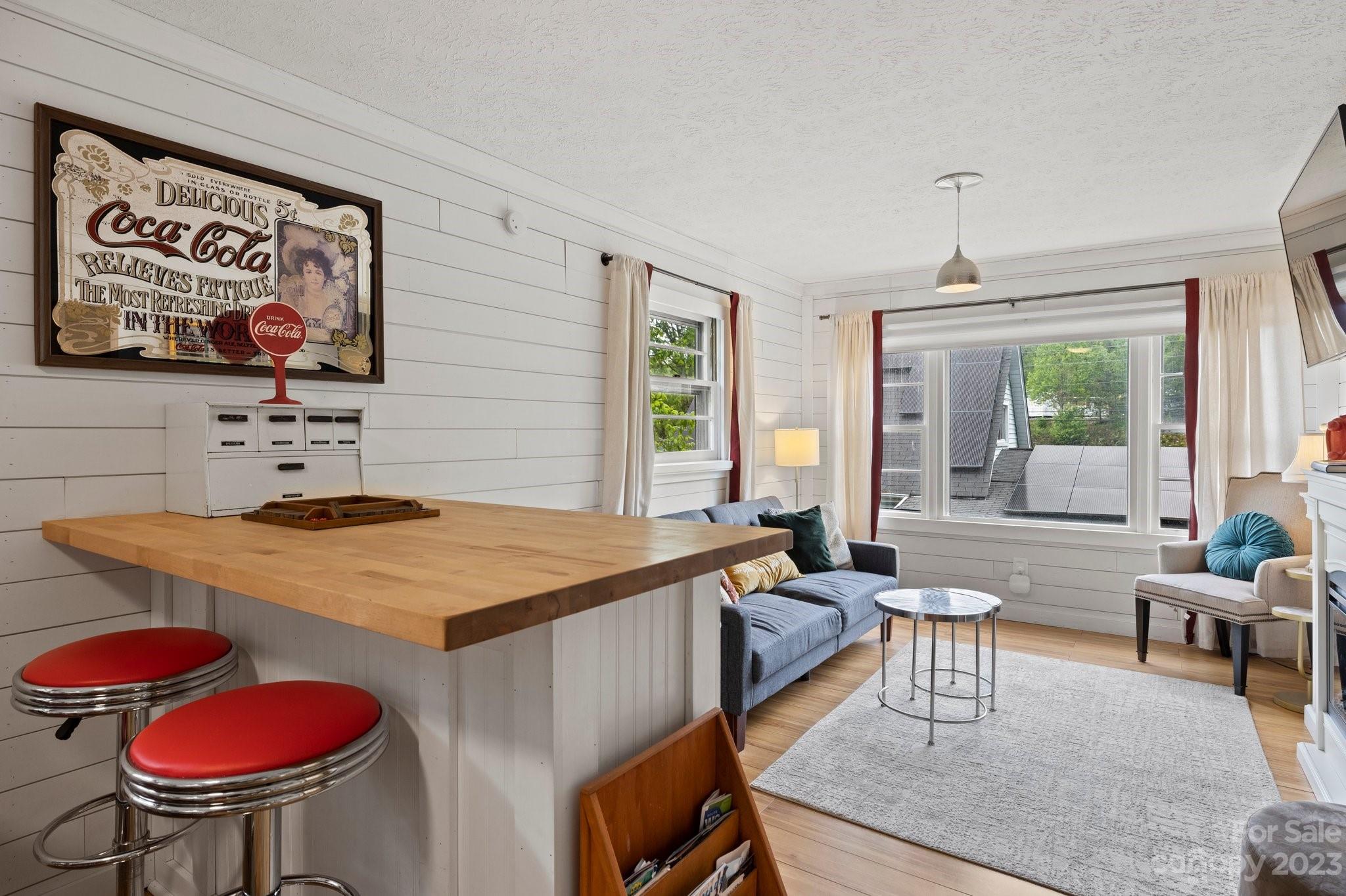 1545 Brevard Road Asheville, NC 28806 - Photo 30 of 43 a living room with furniture and a table