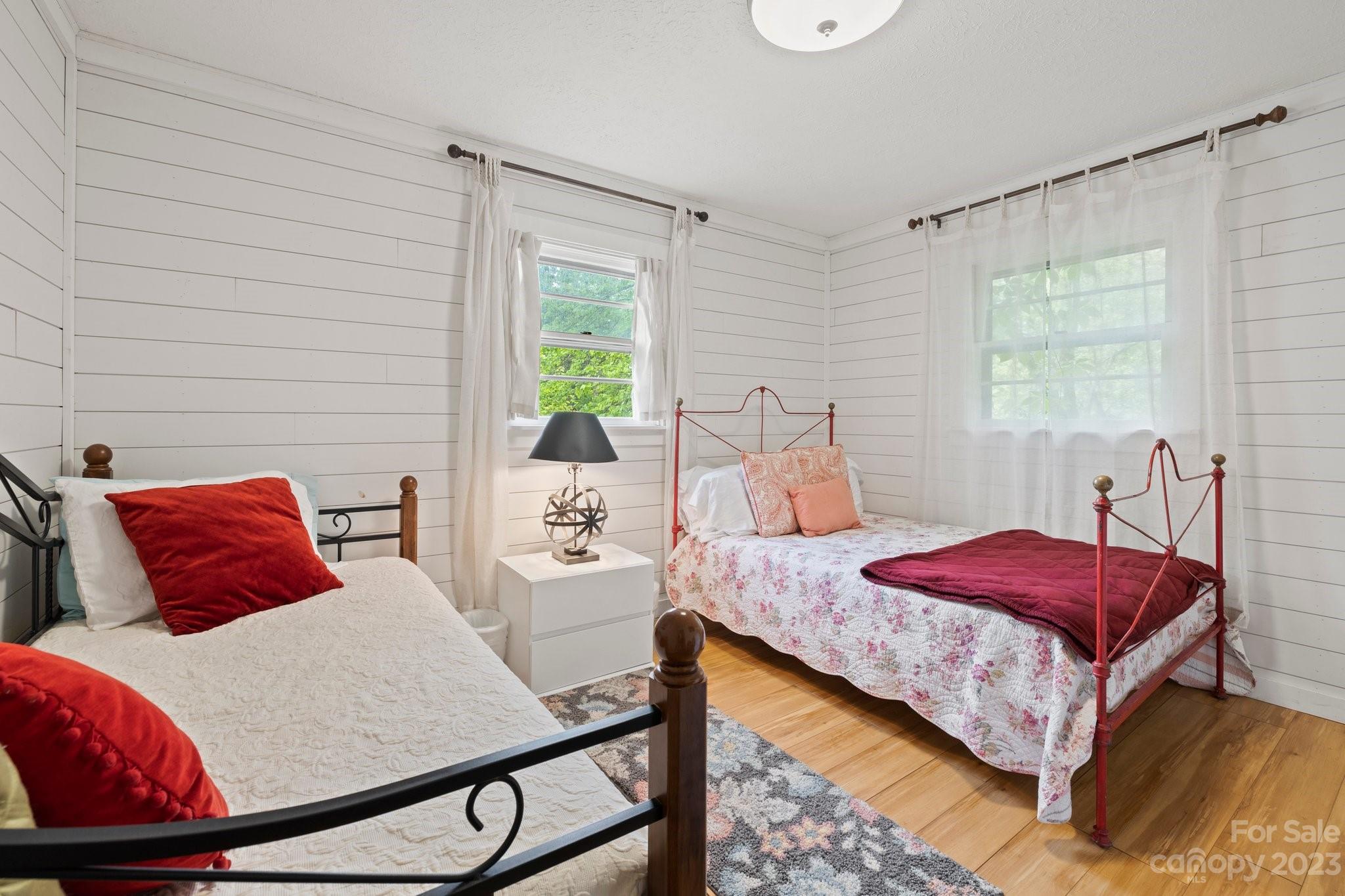 1545 Brevard Road Asheville, NC 28806 - Photo 33 of 43 a bedroom with a bed and window