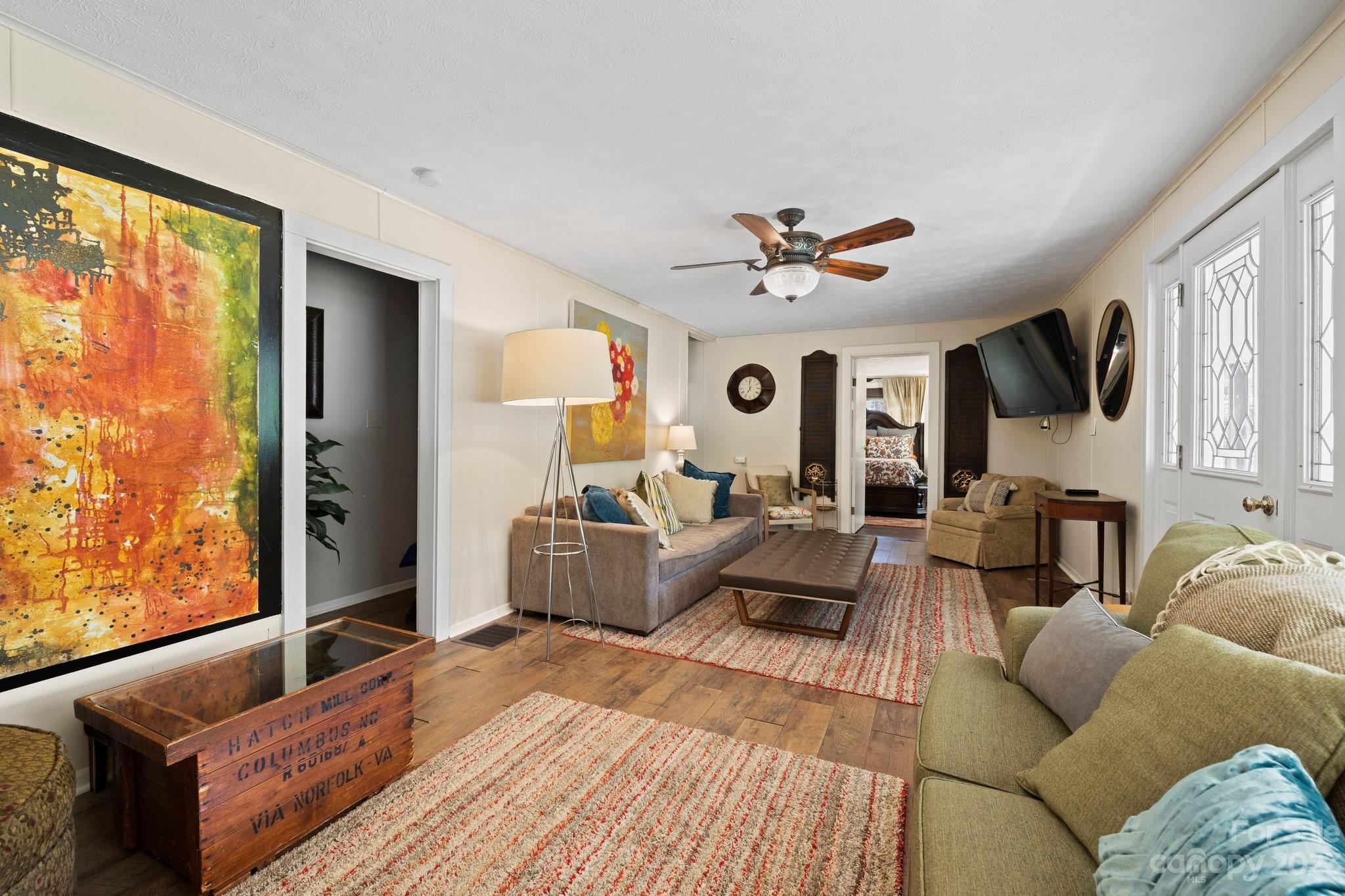 1545 Brevard Road Asheville, NC 28806 - Photo 7 of 43 a living room with furniture and a large window