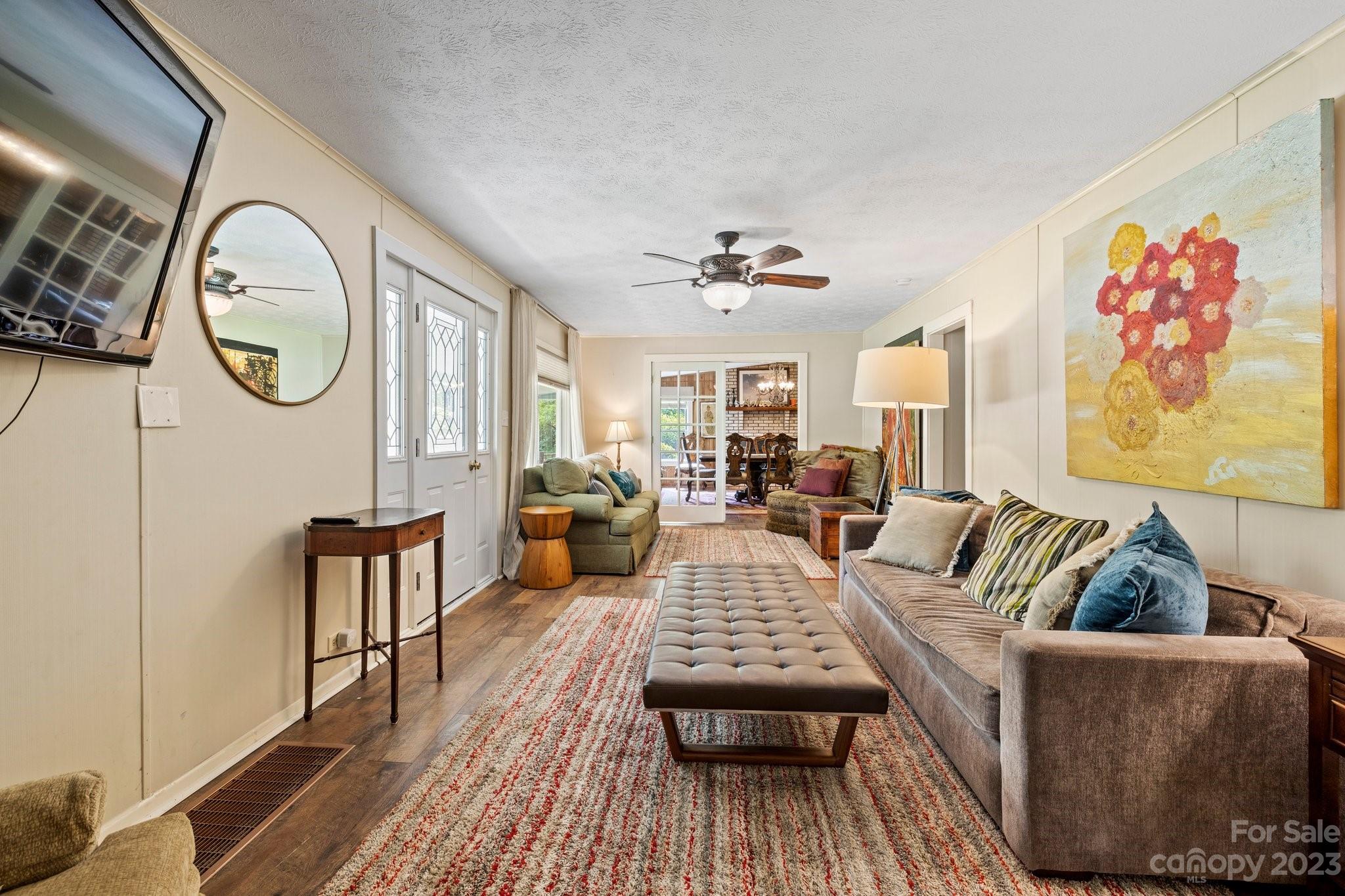 1545 Brevard Road Asheville, NC 28806 - Photo 8 of 43 a living room with furniture and wooden floor