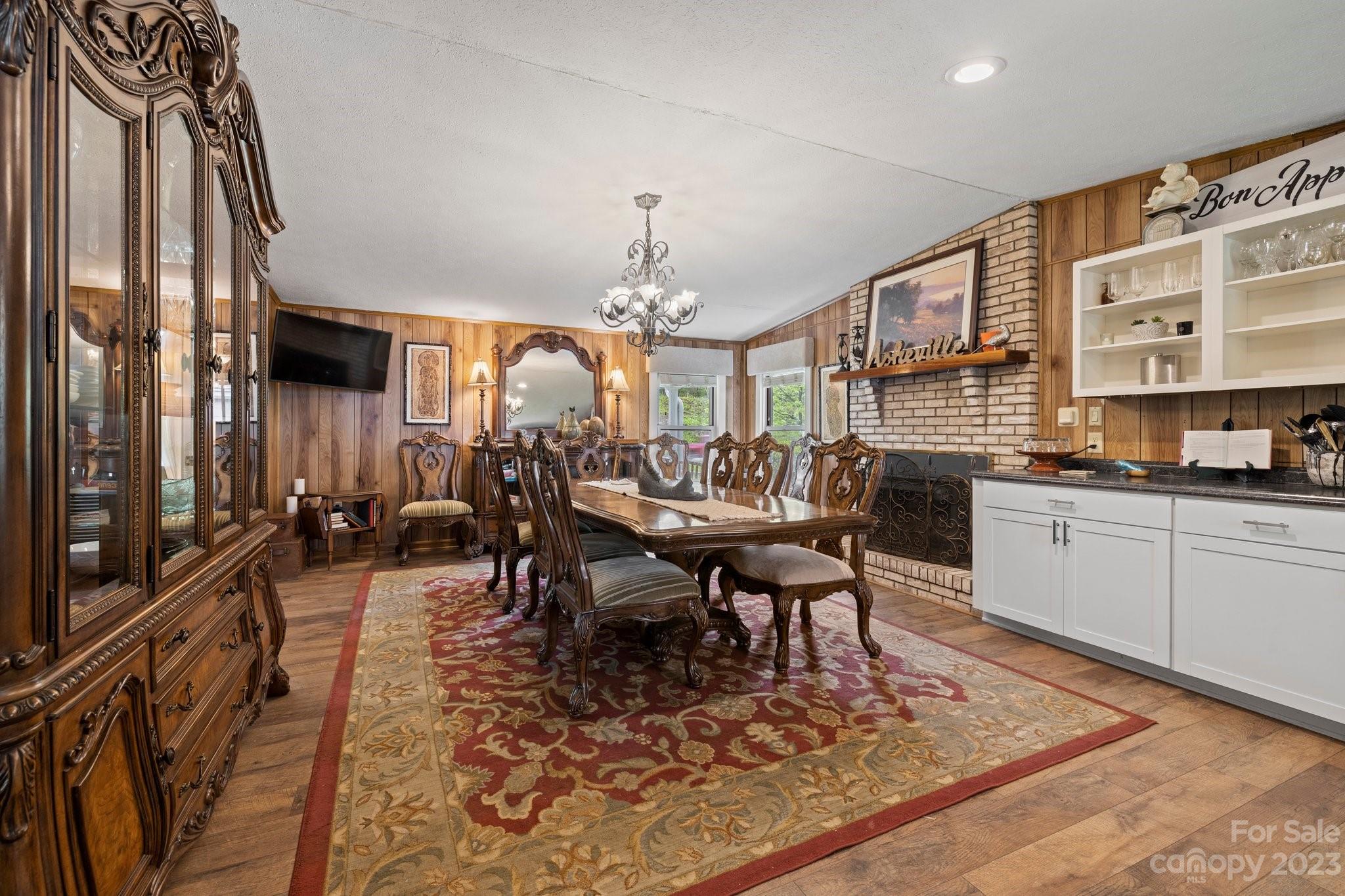 1545 Brevard Road Asheville, NC 28806 - Photo 9 of 43 a view of a dining room with furniture