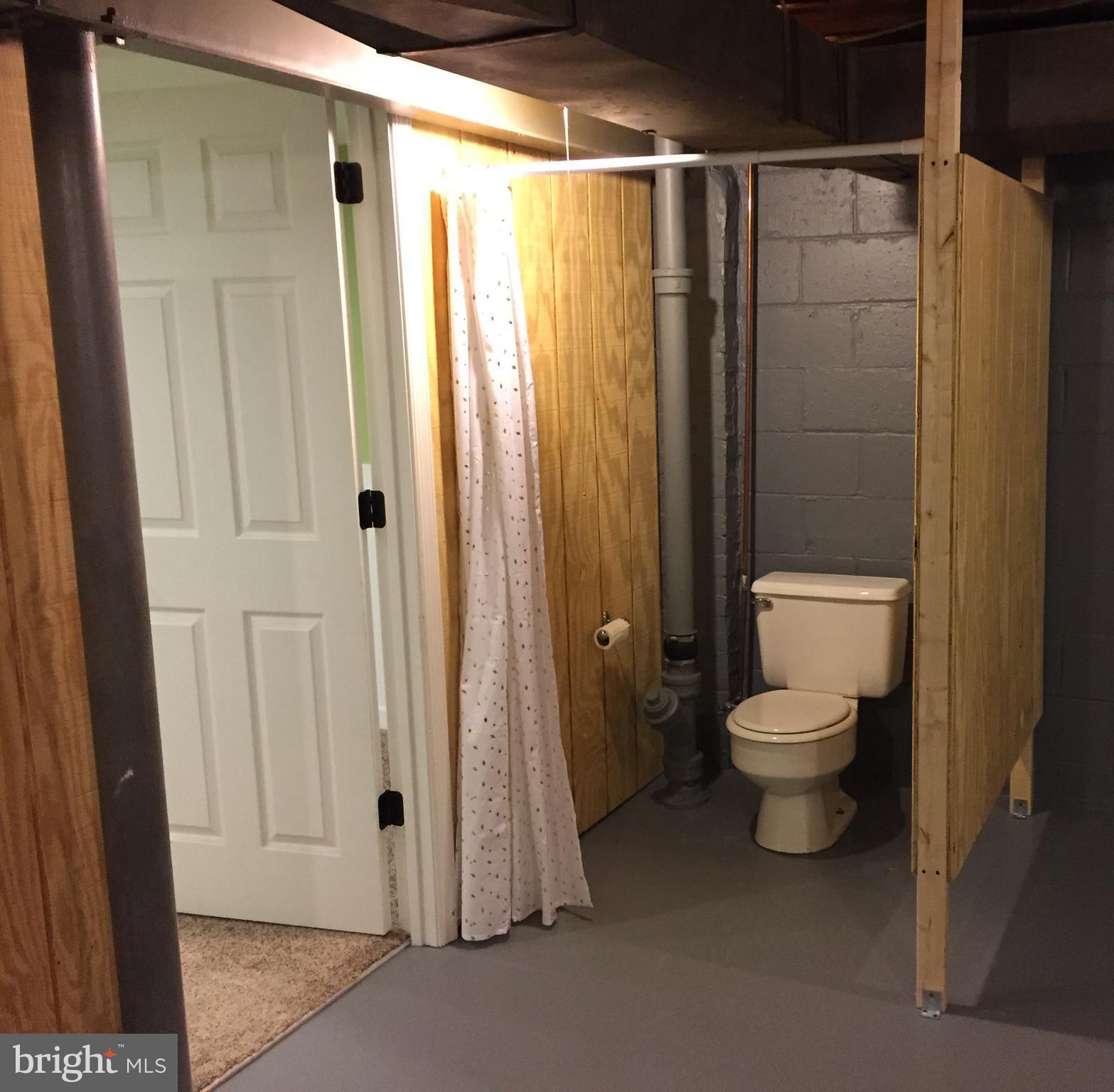 8329 Ridgely Oak Road Baltimore, MD 21234 - Photo 9 of 11 Flush in basement (utility sink also in basement)