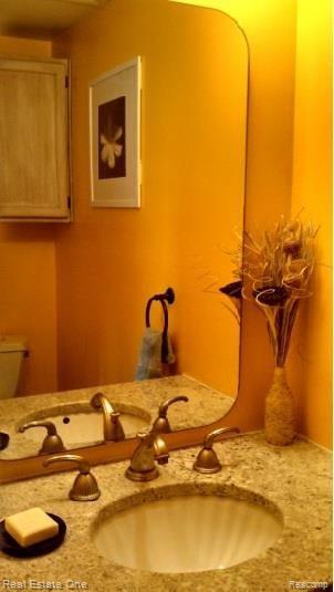 162 Ladd Road, Unit 11 Walled Lake, MI 48390 - Photo 6 of 20 half bath 1.jpg