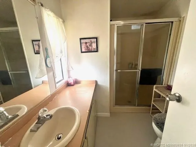 a bathroom with a tub and a sink