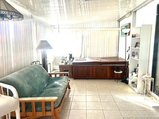 a living room with a couch and a table