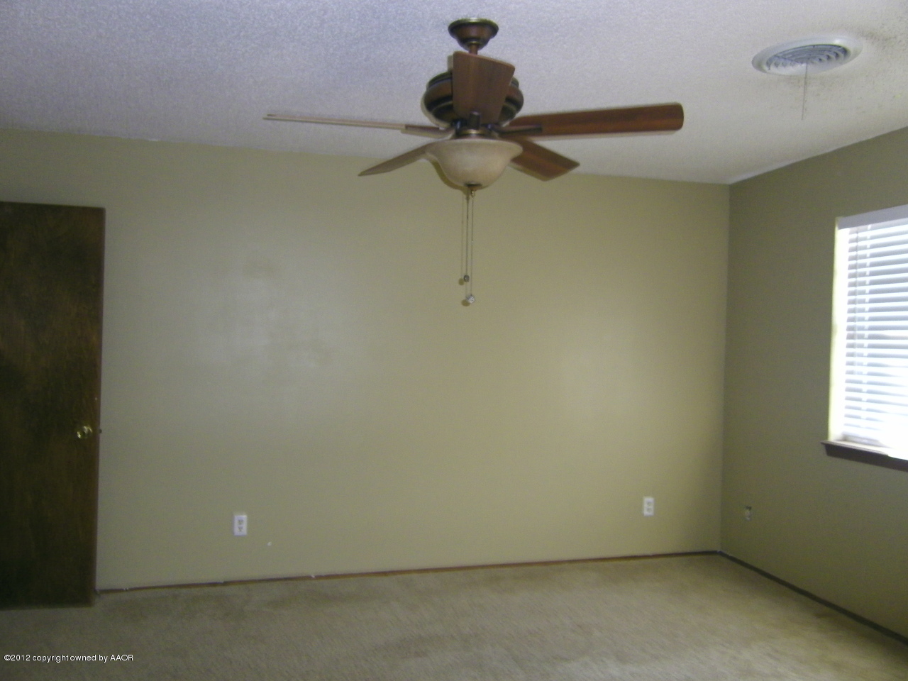 5714 South Milam Street Amarillo, TX 79110 - Photo 15 of 22 a view of a room with a window