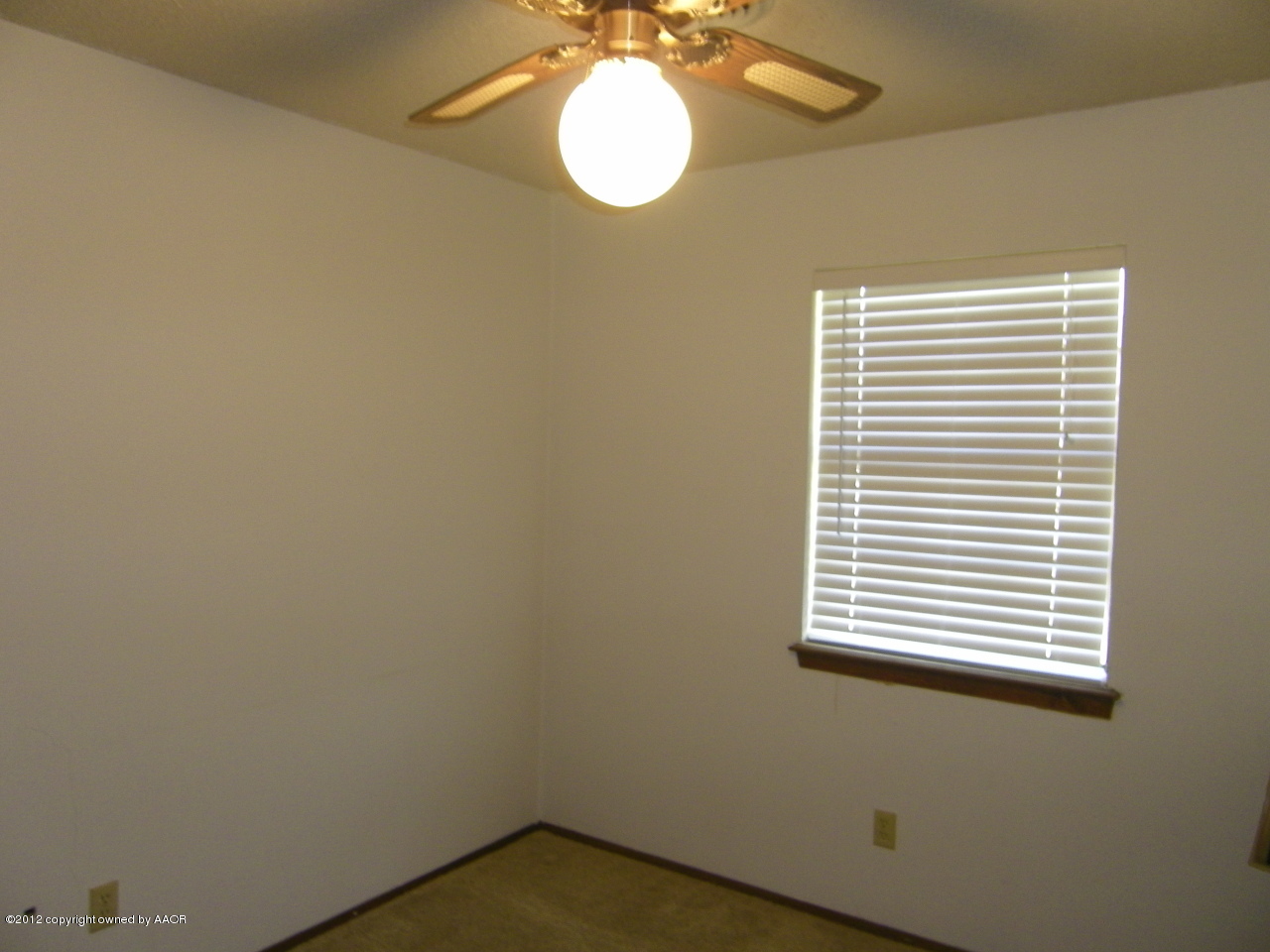 5714 South Milam Street Amarillo, TX 79110 - Photo 10 of 22 a view of a bathroom with a window