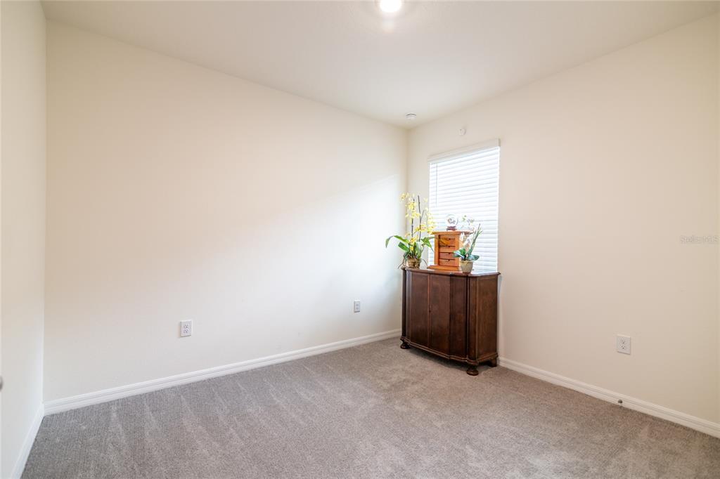 33860 Jasmine Star Loop Wesley Chapel, FL 33543 - Photo 8 of 14 a view of an empty room