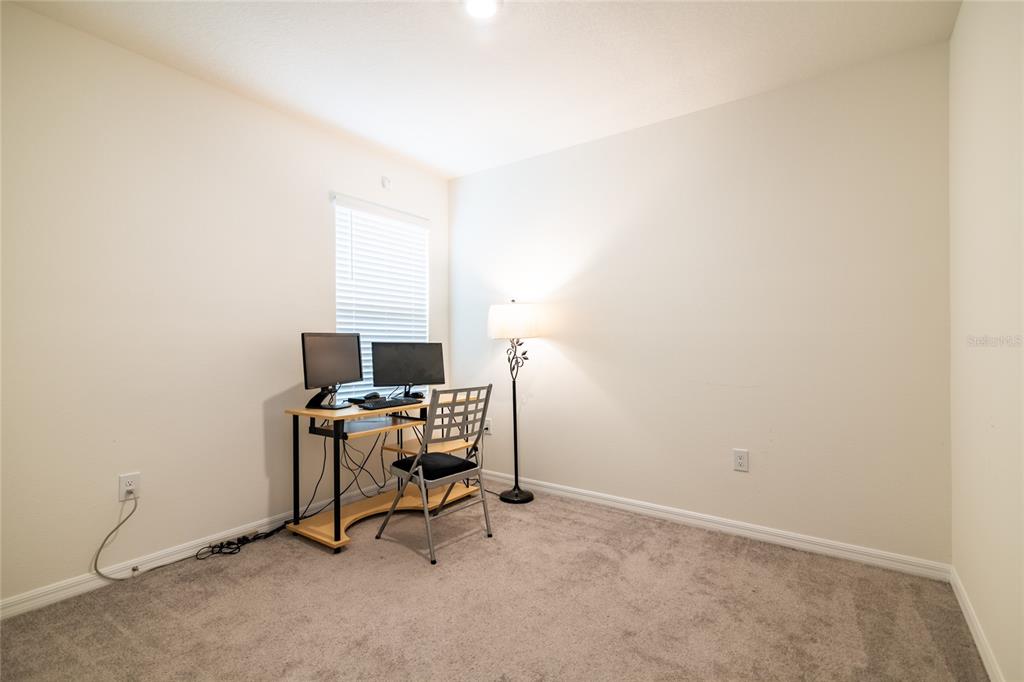 33860 Jasmine Star Loop Wesley Chapel, FL 33543 - Photo 10 of 14 a view of a workspace with furniture