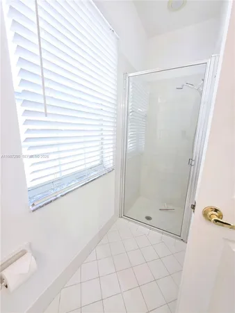 a picture of a room with furniture and window
