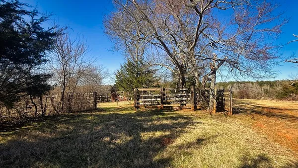 a view of empty room with trees
