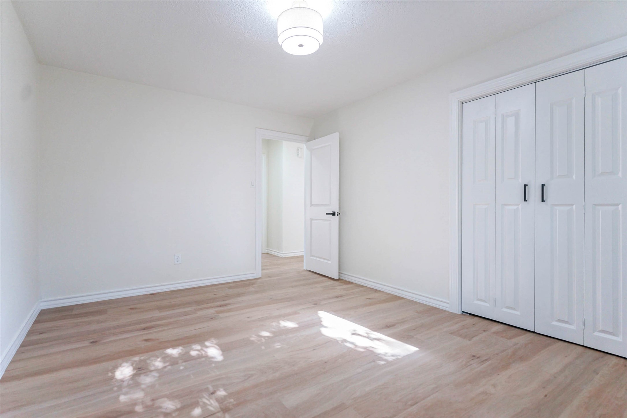 11618 Lakeside Pl Drive Houston, TX 77077 - Photo 12 of 25 a view of an empty room and wooden floor