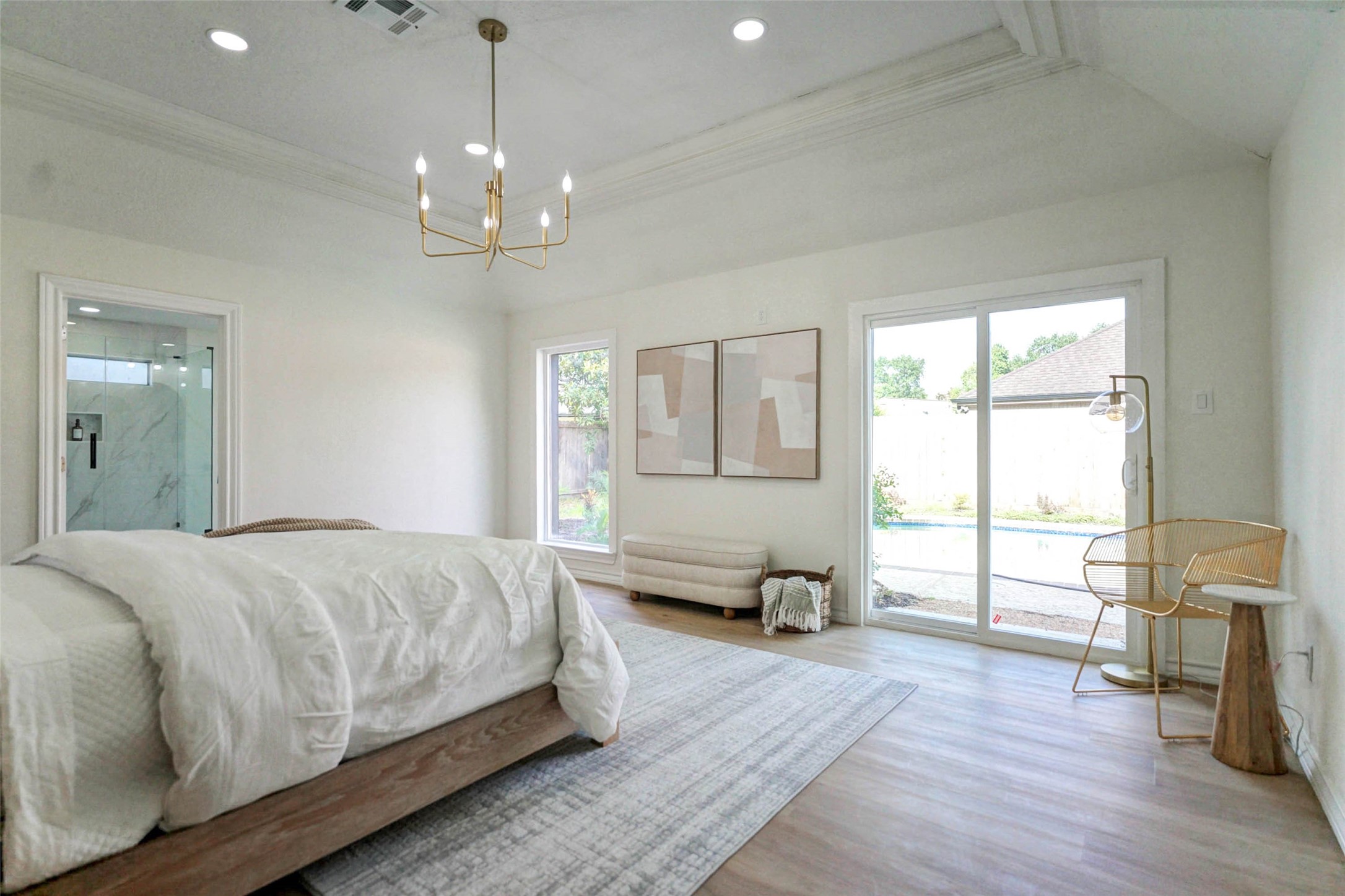 11618 Lakeside Pl Drive Houston, TX 77077 - Photo 13 of 25 a spacious bedroom with a bed and wooden floor