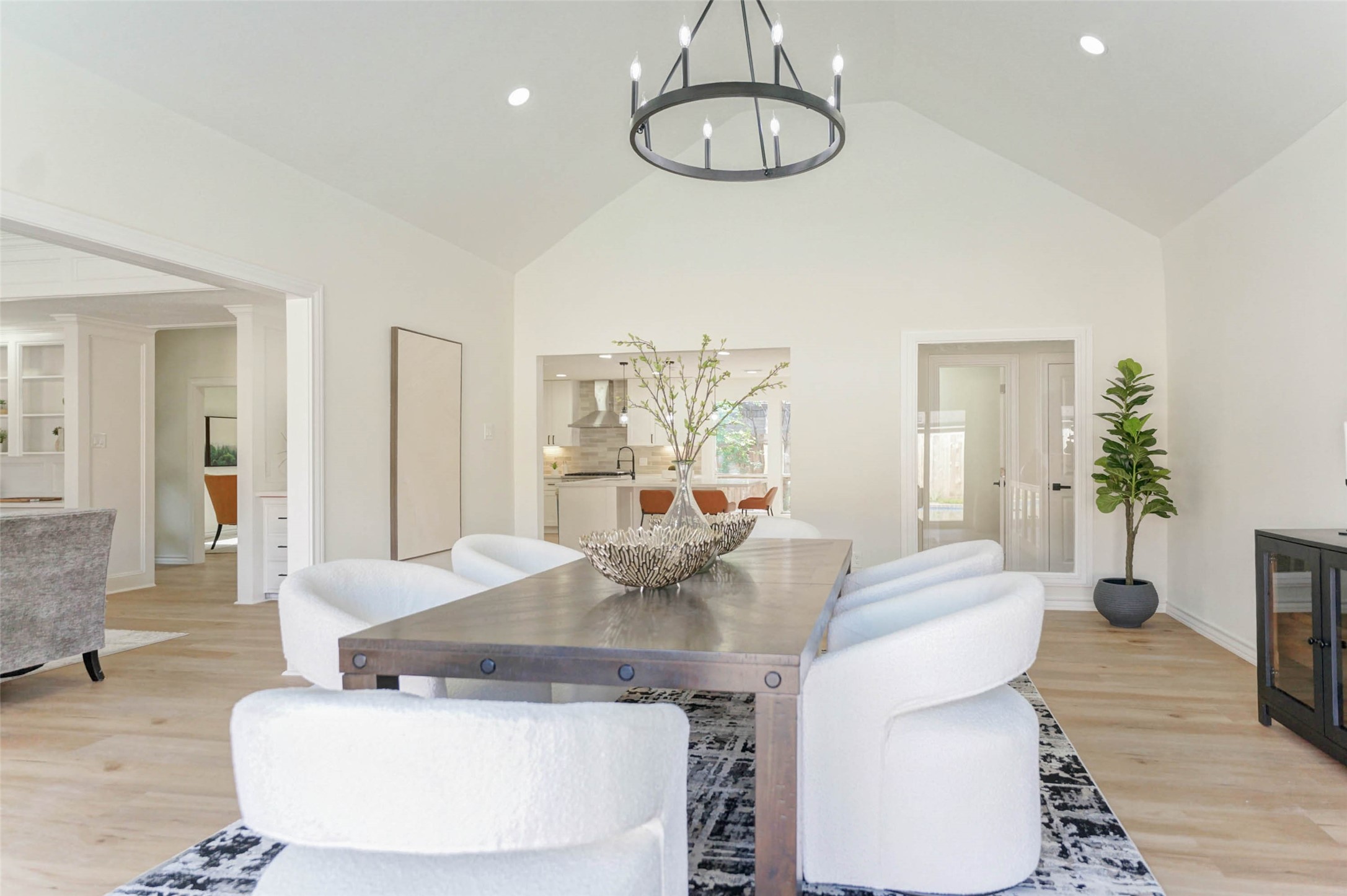 11618 Lakeside Pl Drive Houston, TX 77077 - Photo 2 of 25 a living room with furniture and a chandelier