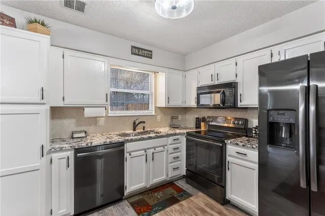 $220,000 | 6125 Northeast Moonstone Court, Lee's Summit, MO 64064