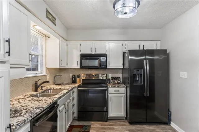 $220,000 | 6125 Northeast Moonstone Court, Lee's Summit, MO 64064