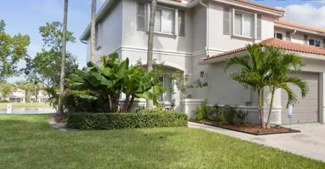 a plant in front of a house