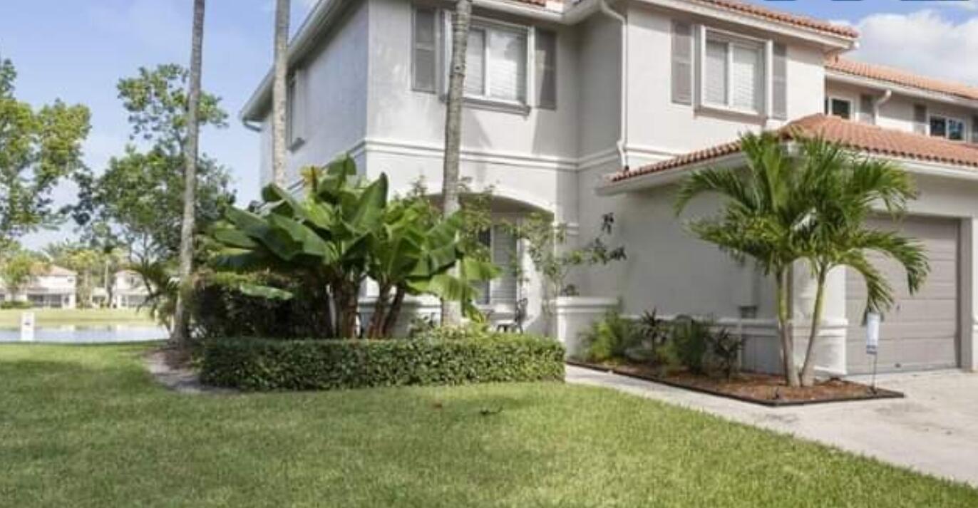 a plant in front of a house