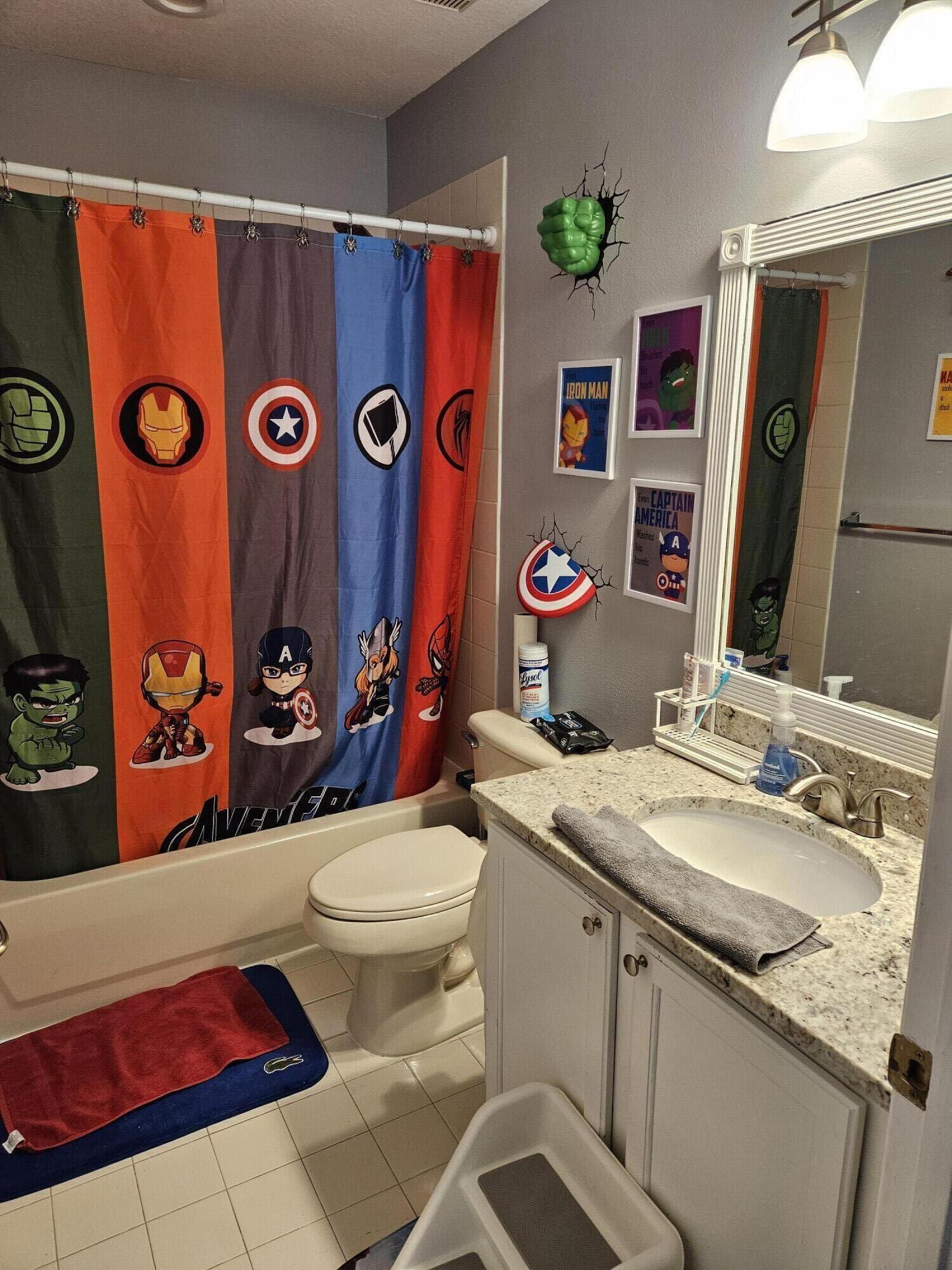 8027 Big Pine Way Riviera Beach, FL 33407 - Photo 3 of 6 a bathroom with a sink mirror vanity and toilet