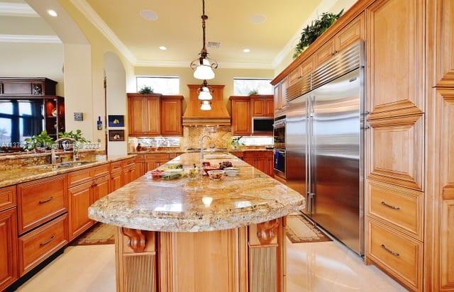 19349 Waters Edge Street Weston, FL 33332 - Photo 2 of 63 a kitchen with stainless steel appliances kitchen island granite countertop a sink and dishwasher