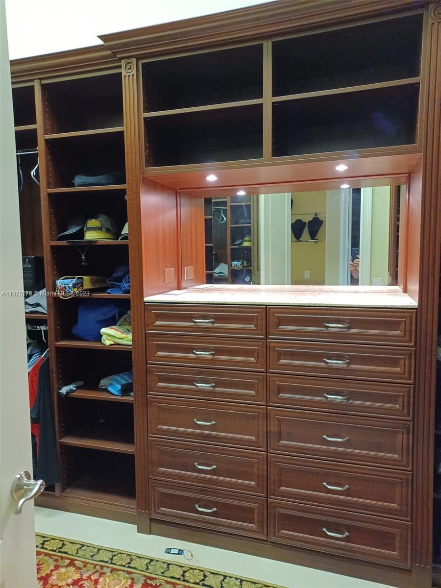 19349 Waters Edge Street Weston, FL 33332 - Photo 22 of 63 a view of walk in closet