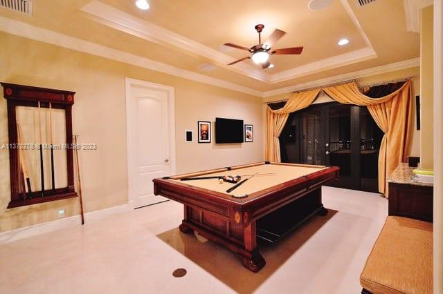 19349 Waters Edge Street Weston, FL 33332 - Photo 27 of 63 a living room with a flat screen tv and a ceiling fan