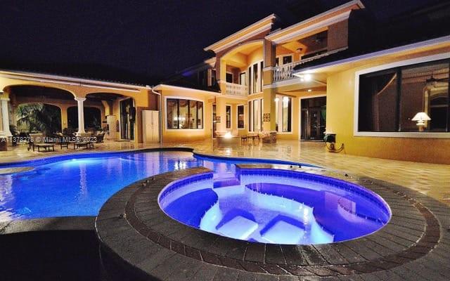 19349 Waters Edge Street Weston, FL 33332 - Photo 48 of 63 a view of swimming pool with outdoor seating