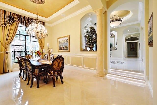 19349 Waters Edge Street Weston, FL 33332 - Photo 9 of 63 a view of a dining room with furniture and chandelier