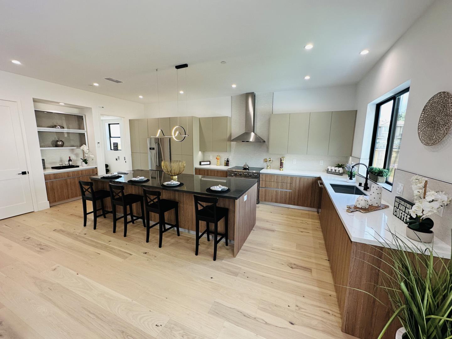 719 East Homestead Road Sunnyvale, CA 94087 - Photo 12 of 47 a large kitchen with lots of counter space and furniture