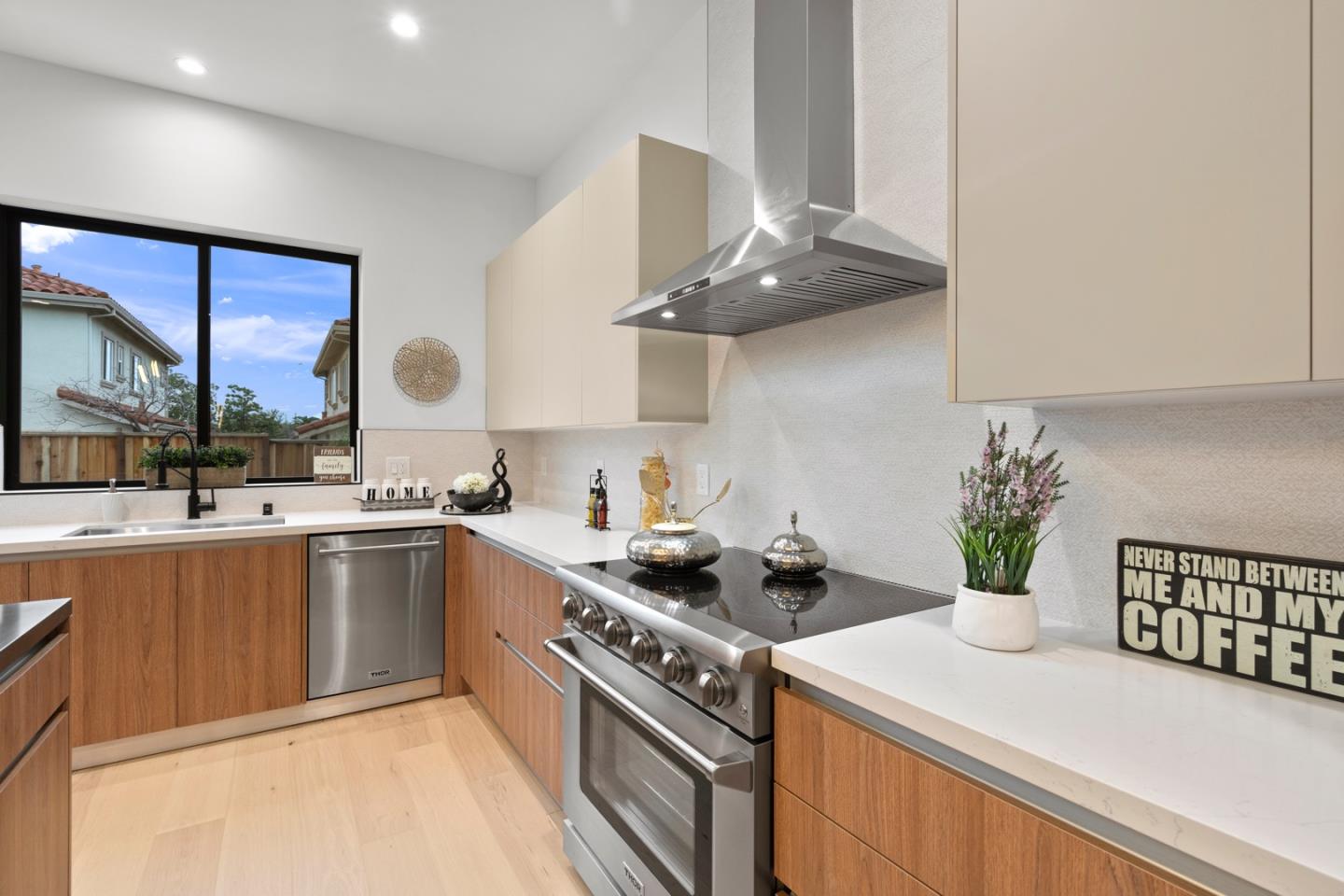 719 East Homestead Road Sunnyvale, CA 94087 - Photo 18 of 47 a kitchen with a stove a sink and cabinets
