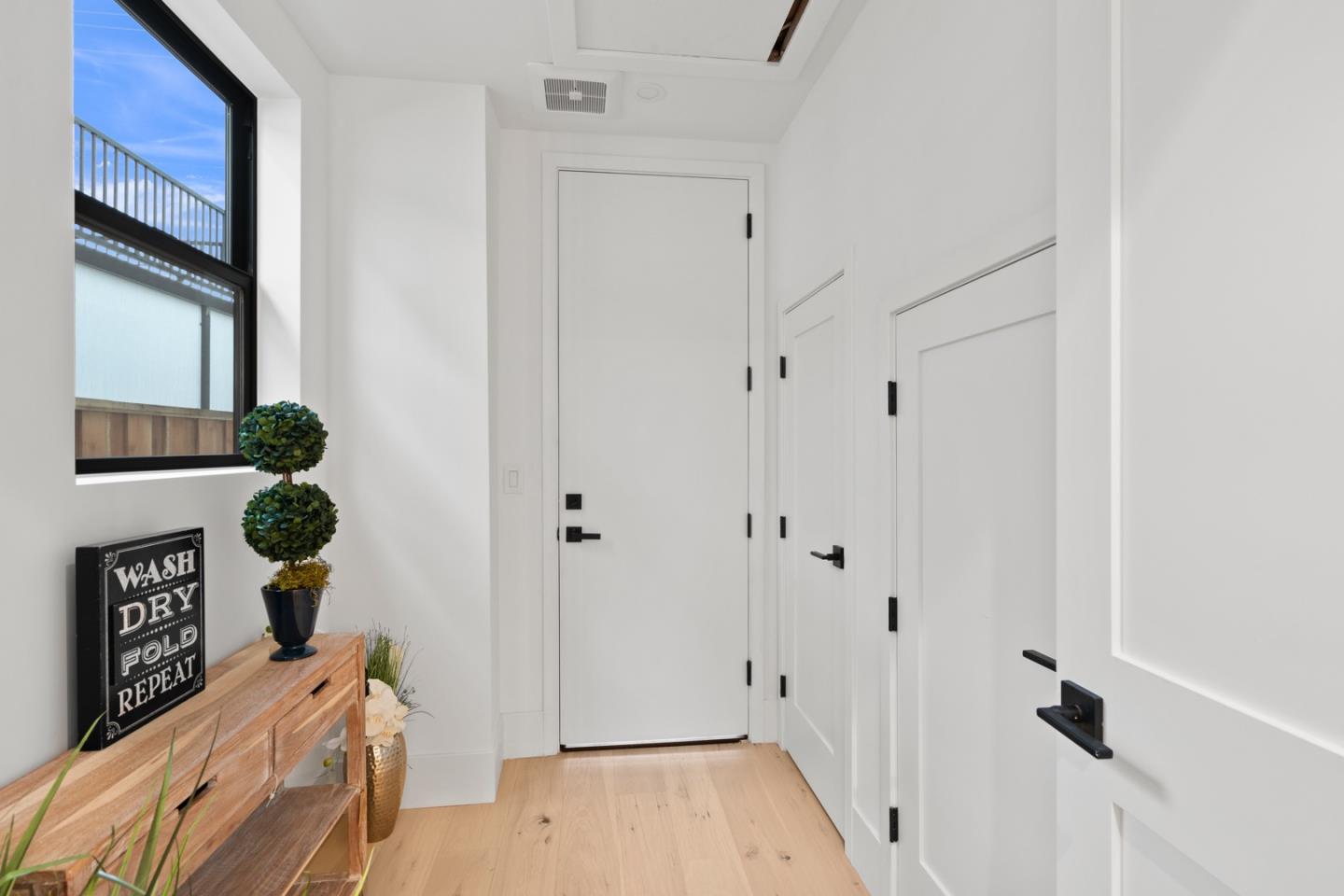 719 East Homestead Road Sunnyvale, CA 94087 - Photo 19 of 47 a view of an entryway with wooden floor